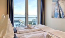 Apartment 25, Pier 25, Apartmenthaus Hafenspitze Blickrichtung offene See/Strand