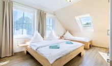 Residenz Haffblick App.12- Wohnbereich mit gemütlichem Sofa