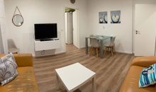 Haus "Melodie der Meeresbrise" Ferienwohnung 1