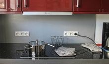 kostenpflichtige Waschmaschine und Trockner im Gemeinschaftskeller