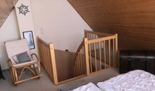 Schlafzimmer im offenen Spitzboden