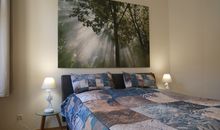 Schlafzimmer 1 mit Doppelbett