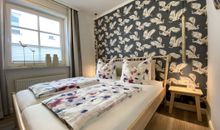 Schlafzimmer mit Doppelbett