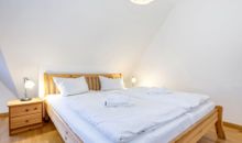Schlafzimmer in der großen Grünen Ferienwohnung