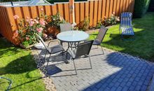 Terrasse mit Liegewiese