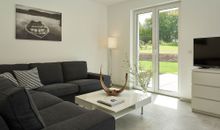 offener Wohnbereich mit Blick in den Garten