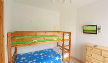 Gäste-/ Kinderzimmer Etagenbett, Kommode und TV
