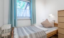 Eines der Einzelbetten im Gäste-/ Kinderzimmer