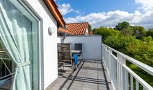 Heller, gemütlicher Wintergarten. Die Fenster lassen sich öffnen