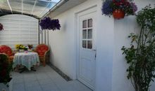 Eingang mit überdachten Terrasse