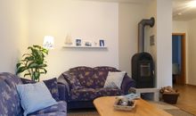 Wohnzimmer mit Kamin