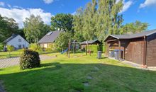 Garten mit Fahrradschuppen, Gemeinschaftssauna und Spielbereich
