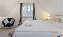Schlafzimmer 1 mit Doppelbett