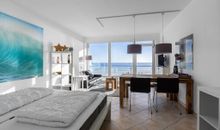 Doppelbett mit Meerblick