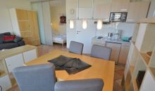 Wohnzimmer mit Kueche