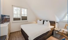 Schlafzimmer 1 mit Doppelbett