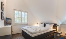 Schlafzimmer 1 mit Doppelbett