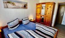 Schlafbereich mit Doppelbett