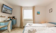 Ferienhaus Am Leuchtturm, Ferienzimmer 2 Seeschwalbe