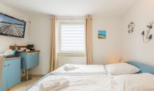 Ferienhaus Am Leuchtturm, Ferienzimmer 2 Seeschwalbe