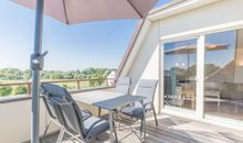 Ferienwohnung Atelier Dachterasse mit Balkonmöbeln