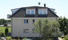 Bad mit ebenerdiger Dusche und Waschmaschine im Erdgeschoss
