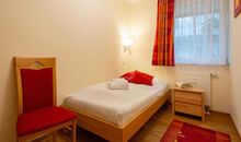 Das zweite Schlafzimmer mit Einzelbett