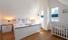 Schlafzimmer 1 im Obergeschoss des Ferienhauses