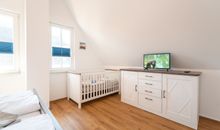 Schlafzimmer 1 im Obergeschoss des Ferienhauses