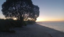 Sonnenuntergang am Strand in Norgaardholz