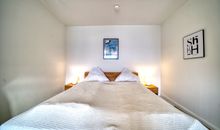 Schlafbereich mit Doppelbett