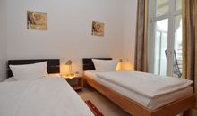 2x Schlafzimmer mit zwei Einzelbetten
