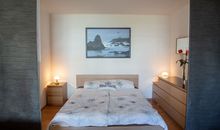 Schlafbereich mit Doppelbett