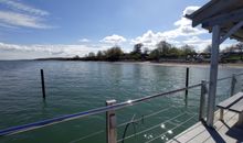 Blick auf den Strand von der Seebrücke Norgaardholz