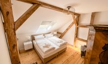 Gutshof Liepe - Ferienwohnung im 1. Obergeschoss - Schlafzimmer 1