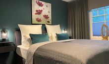 Das Schlafzimmer mit Boxspringbett
