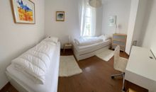 Zweites Schlafzimmer mit 2 Einzelbetten