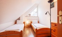 3.Schlafzimmer im Dachgeschoss mit 2. Einzelbetten