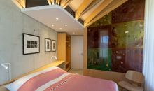Schlafzimmer 1 mit Bad en Suite