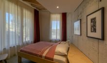 Schlafzimmer 1 mit Bad en Suite