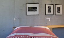 Schlafzimmer 1 mit Bad en Suite