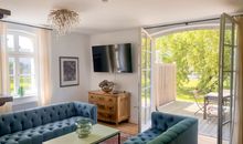 Gutshof Liepe - Ferienwohnung im Erdgeschoss Wohnbereich und Terrasse