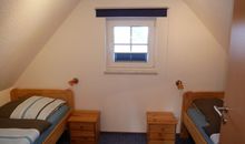 Schlafzimmer 2 mit zwei Einzelbetten