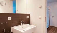 Badezimmer mit Dusche und WC
