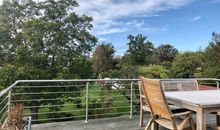 Ferienwohnung mit Dachterrasse und Blick in den altgewachsenen Garten