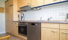 Die separate Küche mit allen wichtigen Küchengeräten