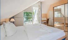 Schlafzimmer mit Doppelbett