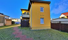 Hausansicht Nebengebäude / Eingang Appartement 02 und Wohnung 05