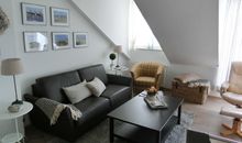 Eingang zur Ferienwohnung mit Sitzecke