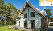 Gartenansicht des Hauses mit Terrasse